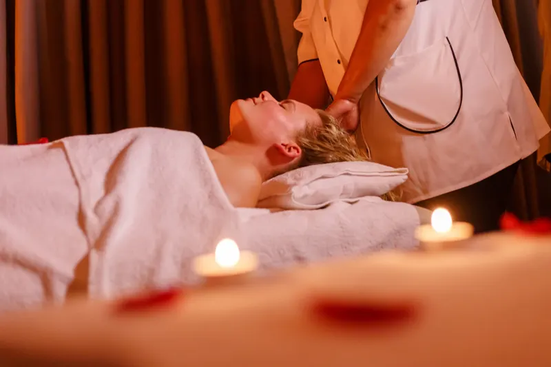 Relaxing massage in a candlelit spa - Dragonzay Photography