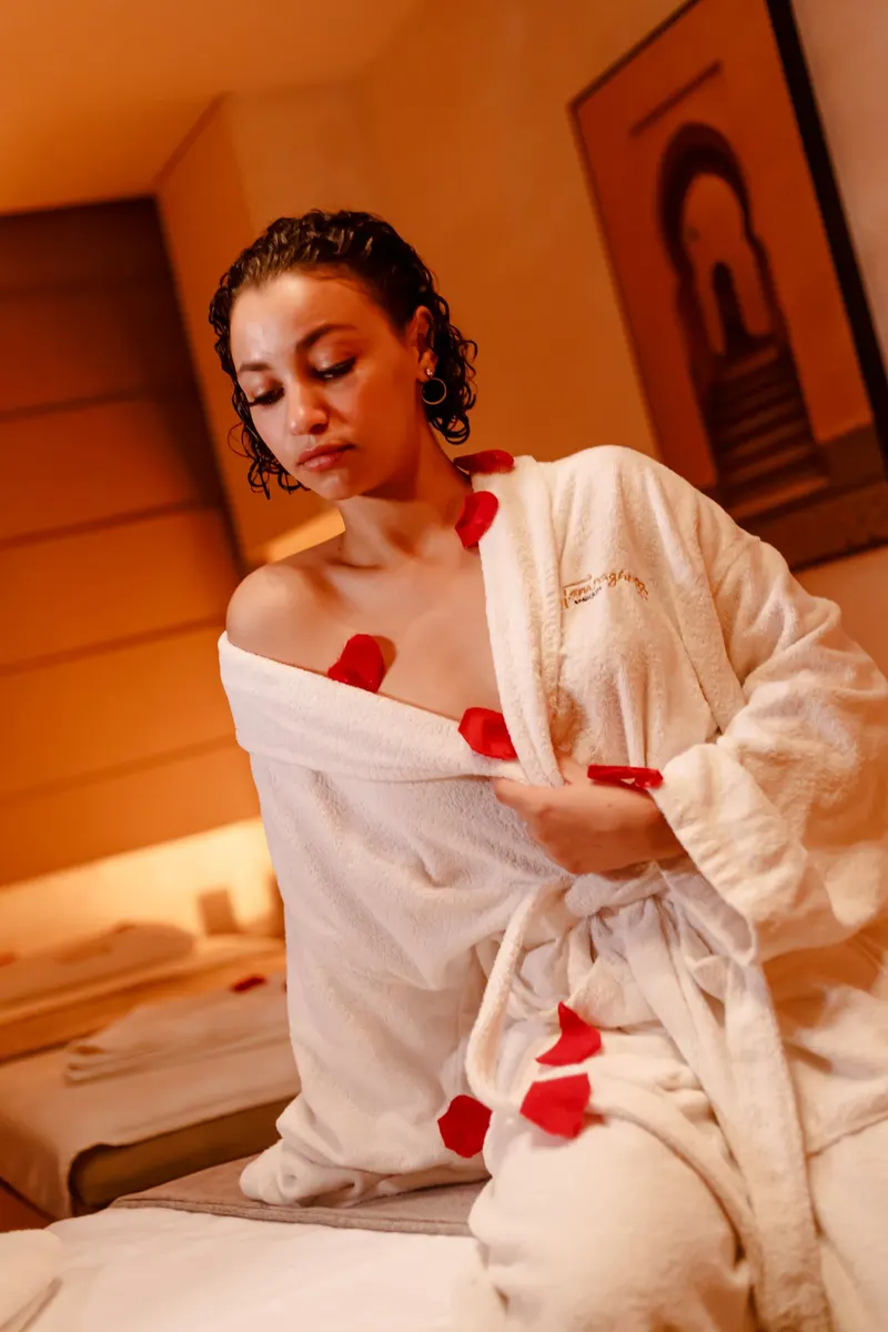 Relaxed client in a towel in a spa area - Dragonzay Photography