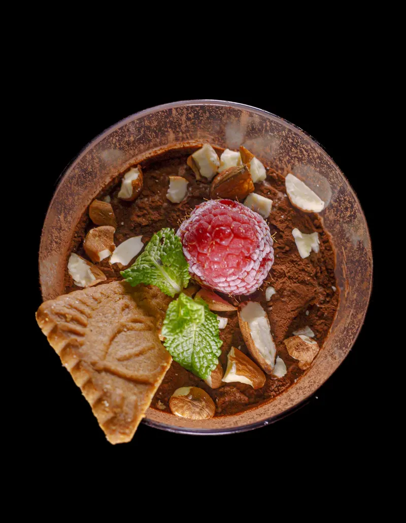 Tiramisu in a clay bowl with raspberry and mint - Dragonzay Photography