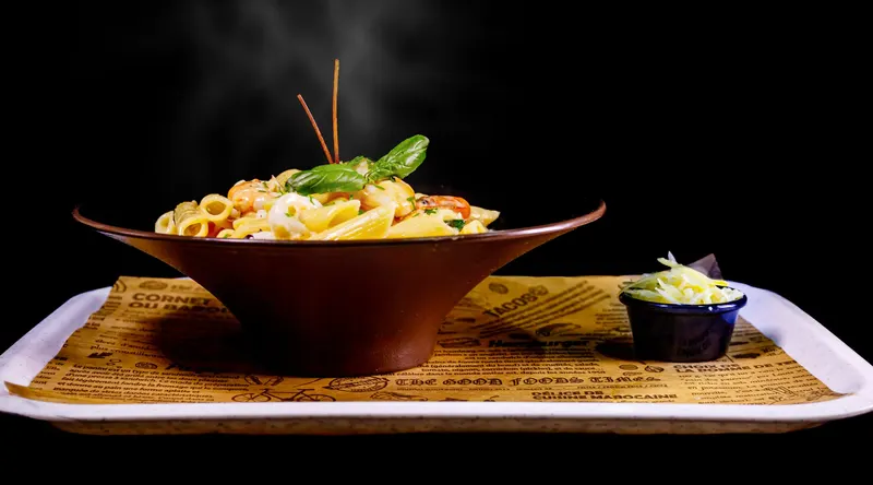 Steaming bowl of pasta with basil - Dragonzay Photography