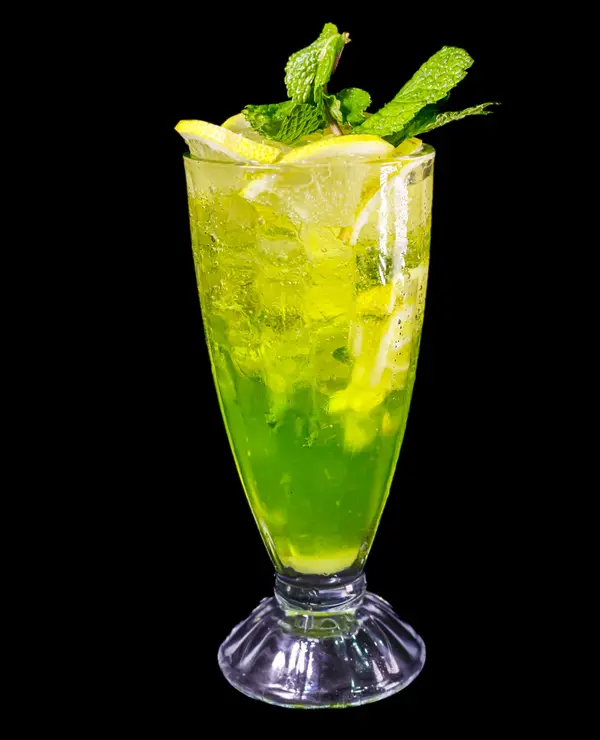 Green mojito with fresh mint on a black background - Dragonzay Photography