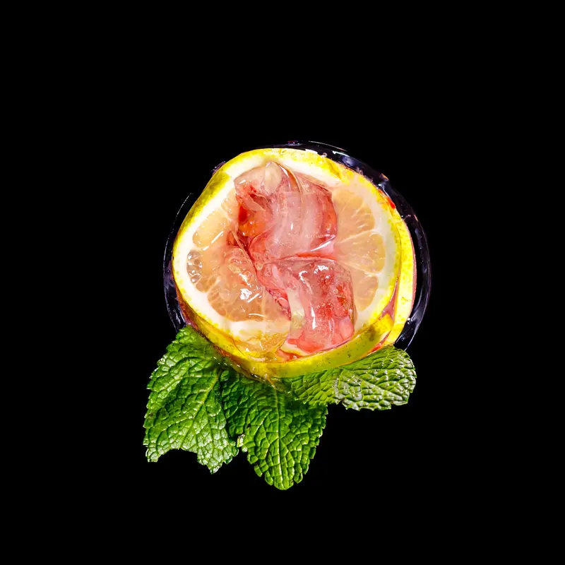 Sliced blood lemon on mint leaves - Dragonzay Photography