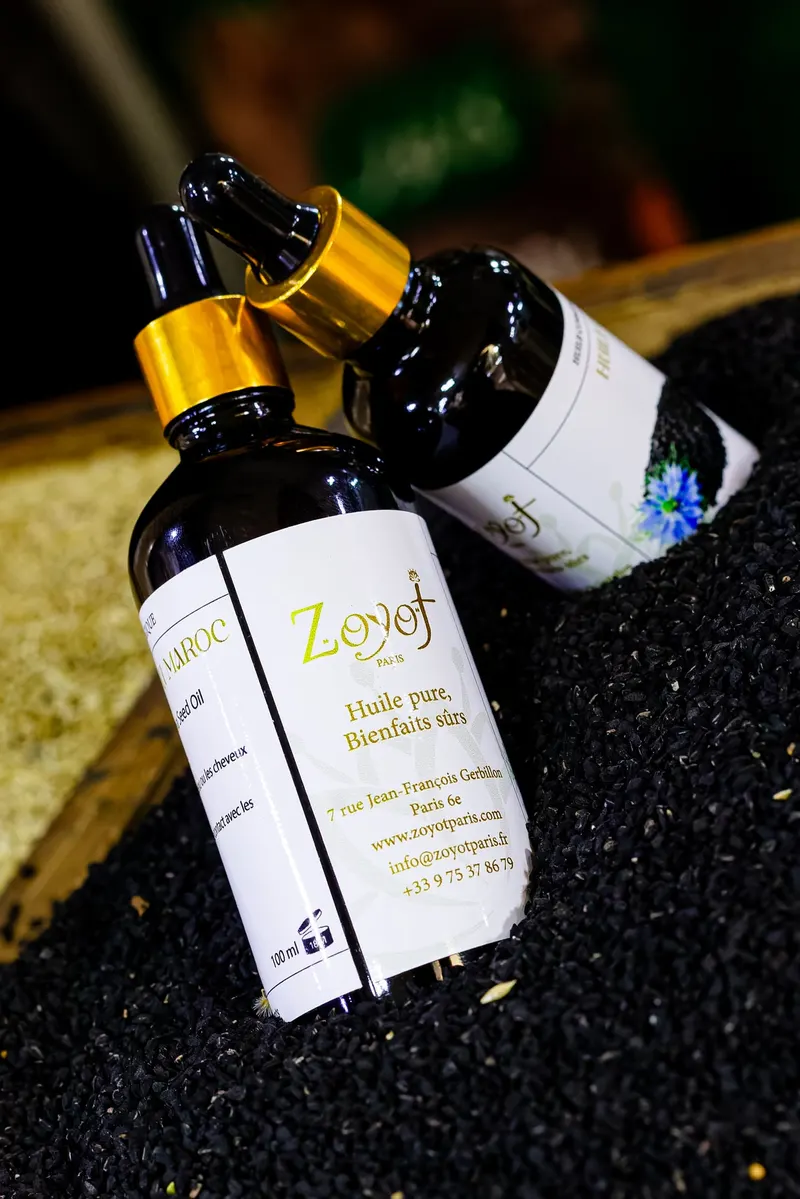 Zeyof argan oil bottle on argan seeds and nuts - Dragonzay Photography
