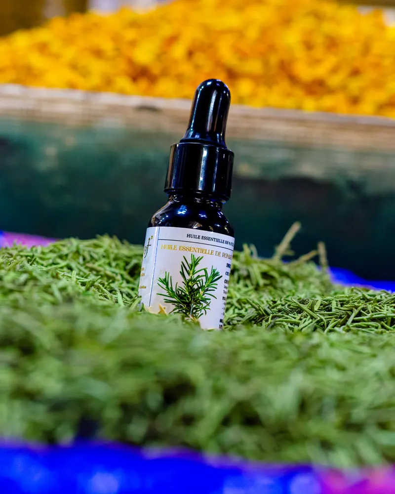 Essential oil bottle on fresh rosemary - Dragonzay Photography