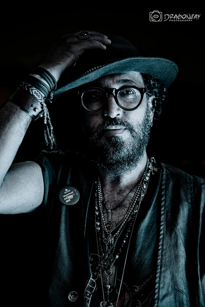 Artistic portrait of a bearded man in a hat and round glasses - Dragonzay Photography
