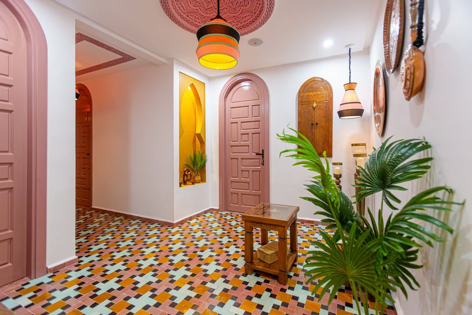 Hallway with arched doors and colourful zellige tiles - Dragonzay Photography