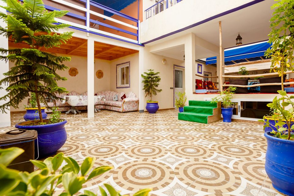 White and blue inner patio of a riad - Dragonzay Photography